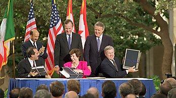 NAFTA Initialing Ceremony, October 1992 From left to right (standing) President Salinas, President Bush, Prime Minister Mulroney (Seated) Jaime Serra Puche, Carla Hills, Michael Wilson.