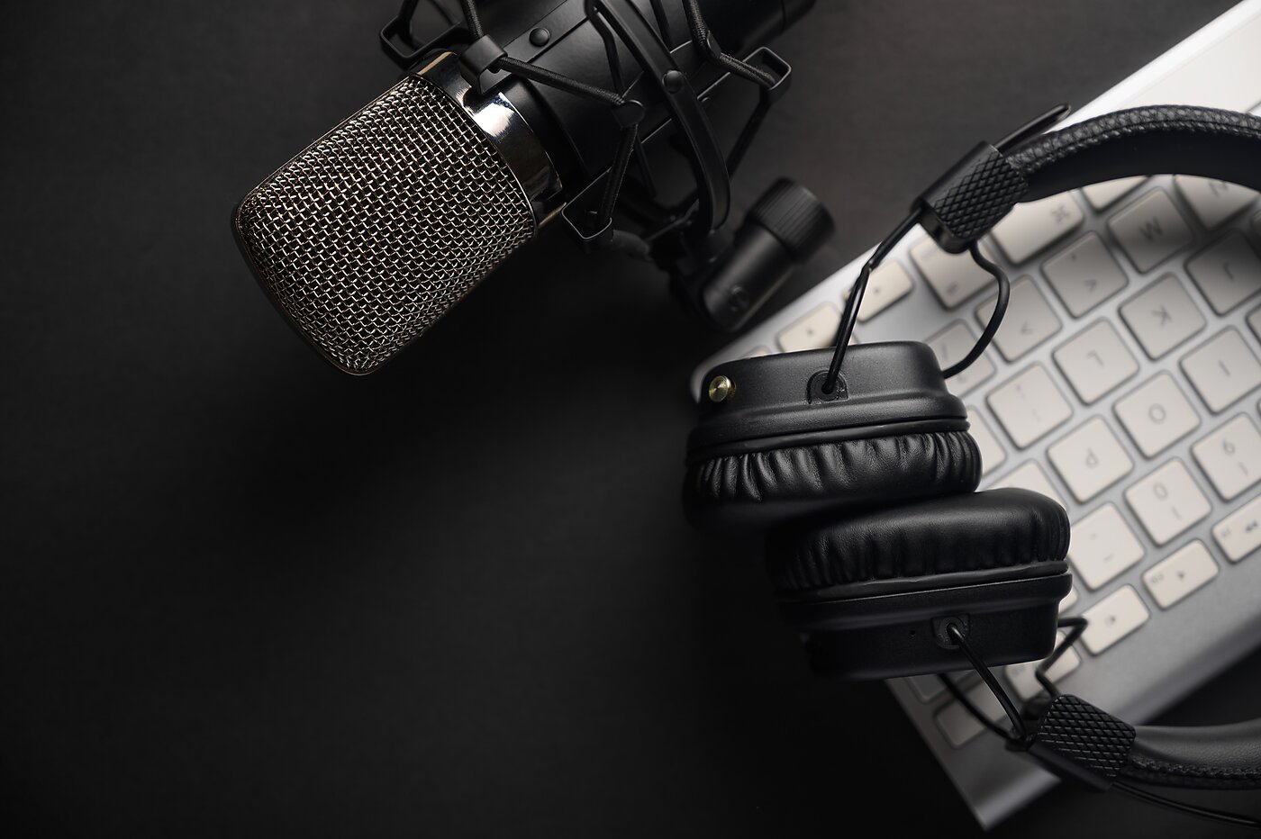 Podcast recording equipment on a desk
