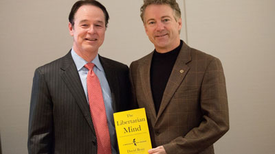 Rand Paul and David Boaz with book Libertarian Mind