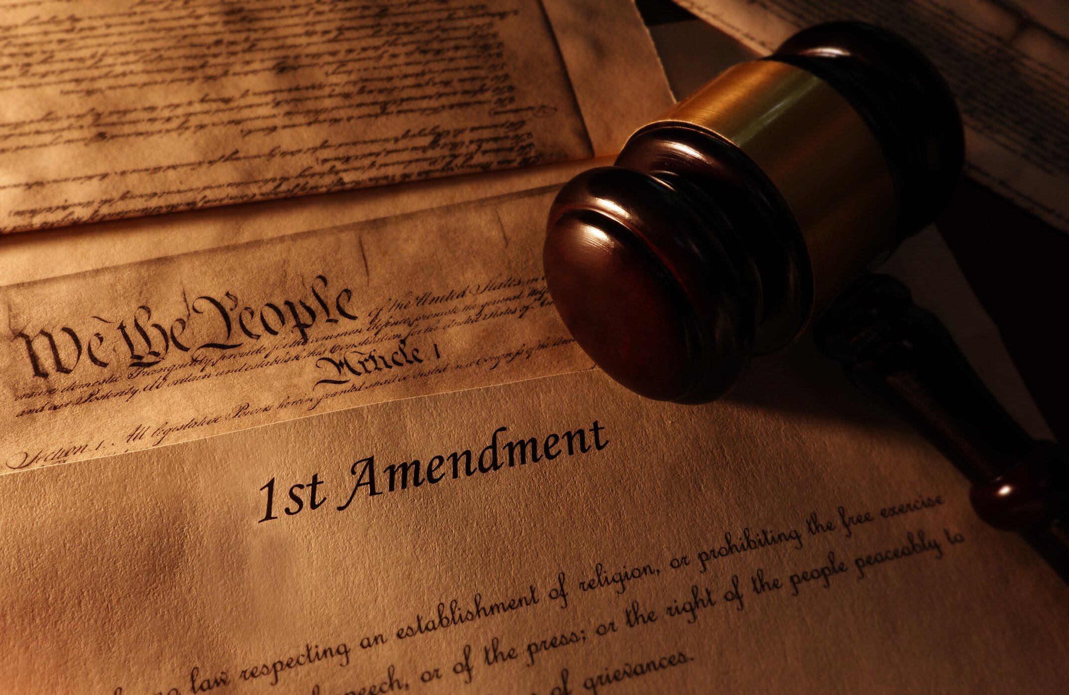 The constitution with the first amendment and a gavel