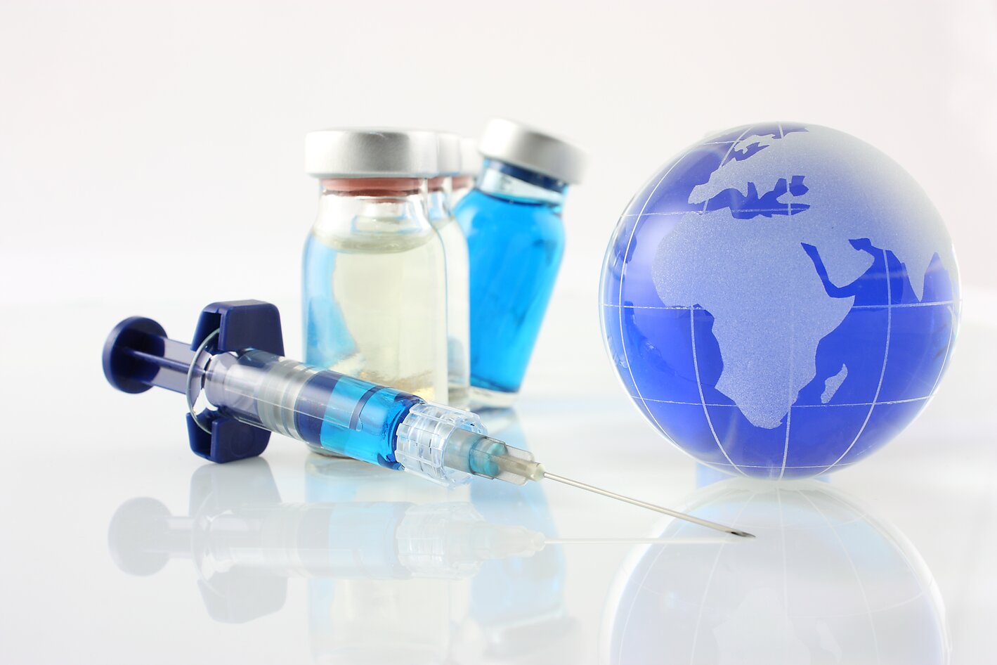 Vaccine vial with needle and globe