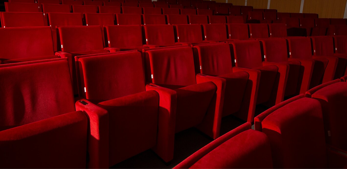 Red seats in Cato's auditorium