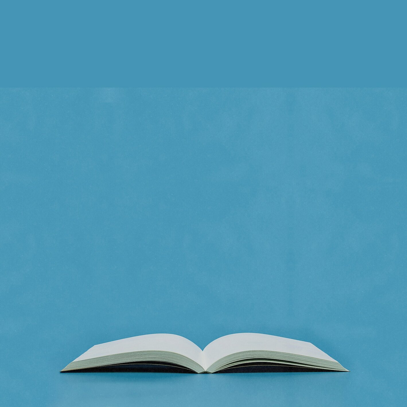 Open book with blue background