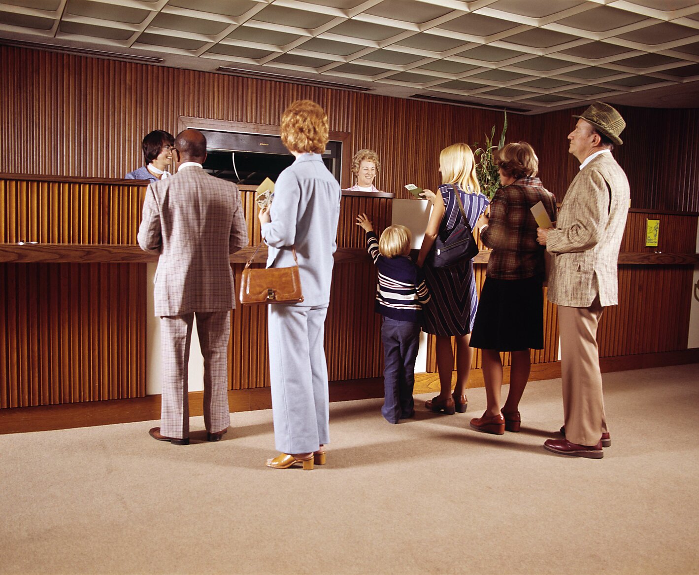 1970s bank customers wait in line