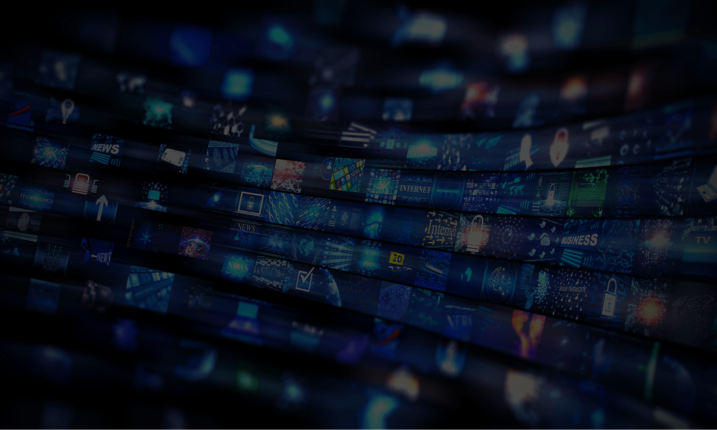 A wall of televisions tuned into news programming.