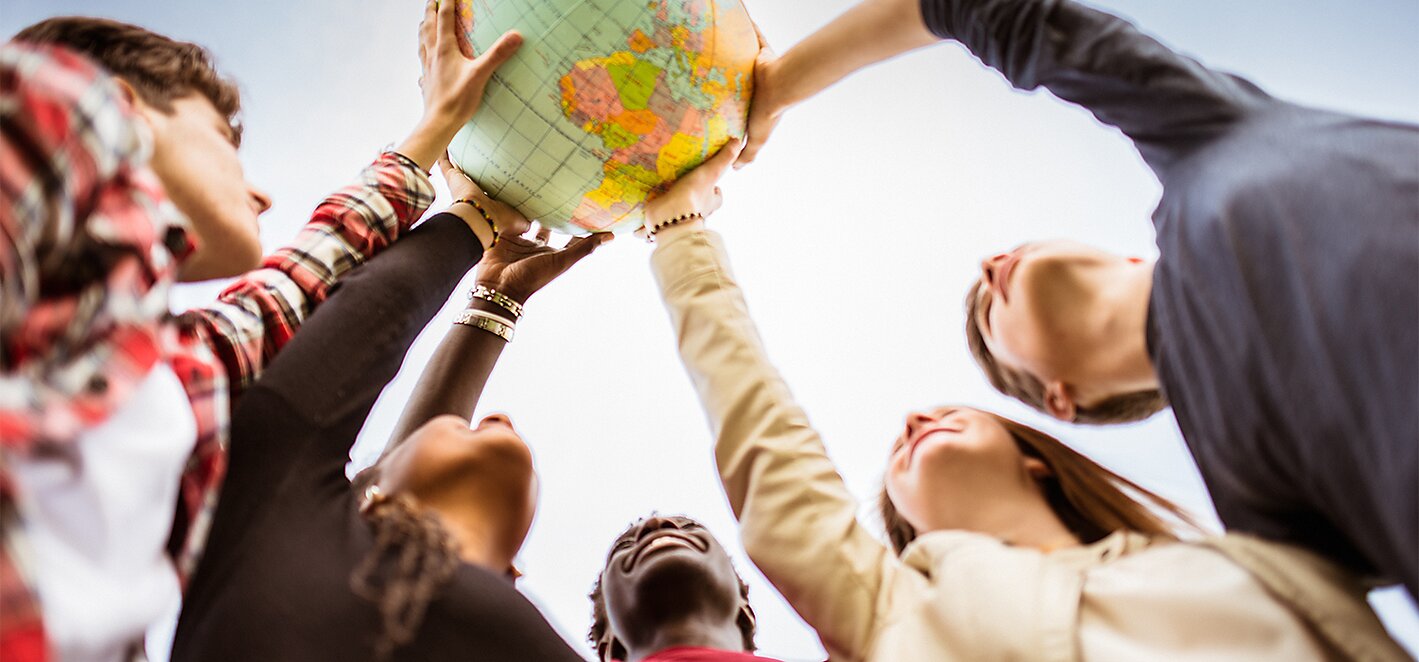 Defending Globalization - Teens Reaching for Globe - Banner