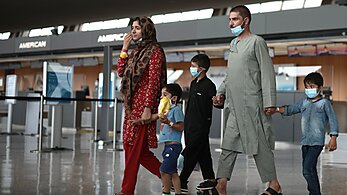 Afghan family arriving at Dulles International Airport