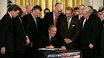 President George W. Bush signs the Patriot Act