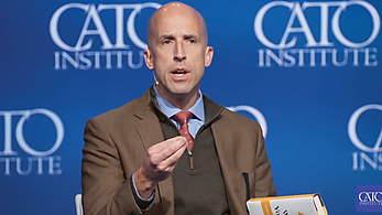 Michael Cannon speaks at an event