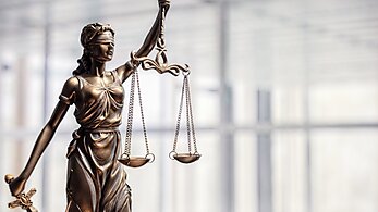 statue of justice and the scales