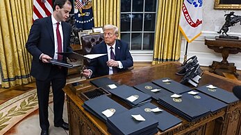 Trump signing pardons