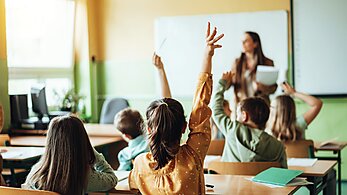 Children Raising Hands - 2024 Annual Report